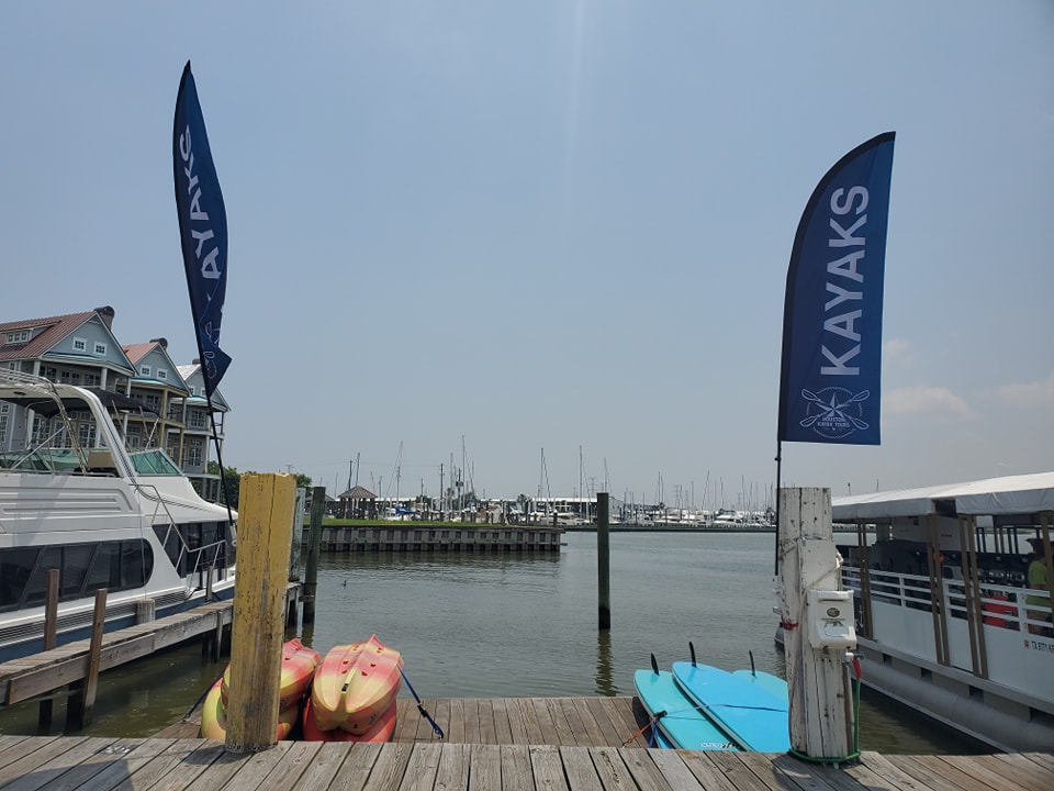 a boat that is sitting on a dock next to a body of water